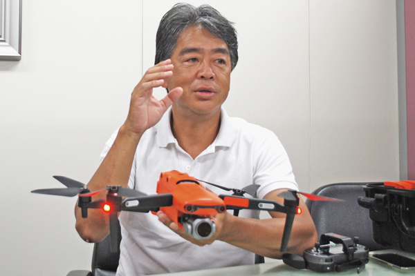 検崎 雄二 氏